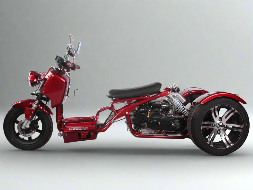 PST150-19N burgundy side view. Honda ruckus trike