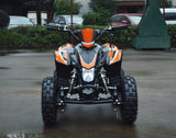 49cc Mini Quad ATV in orange/black combo parked forward revealing headlight area and front of ATV