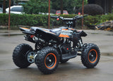 49cc Mini Quad ATV in orange/black combo parked diagonally facing its rear to the right side / aluminum pull start side of the ATV