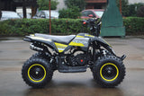 49cc Mini Quad ATV in yellow/black combo parked sideways revealing right side of ATV when sitting on it. Metal Pull Start and 49cc engine revealed.