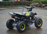49cc Mini Quad ATV in yellow/black combo parked diagonally facing its rear showing dual exhaust pipes and free upgrade to matching yellow rims