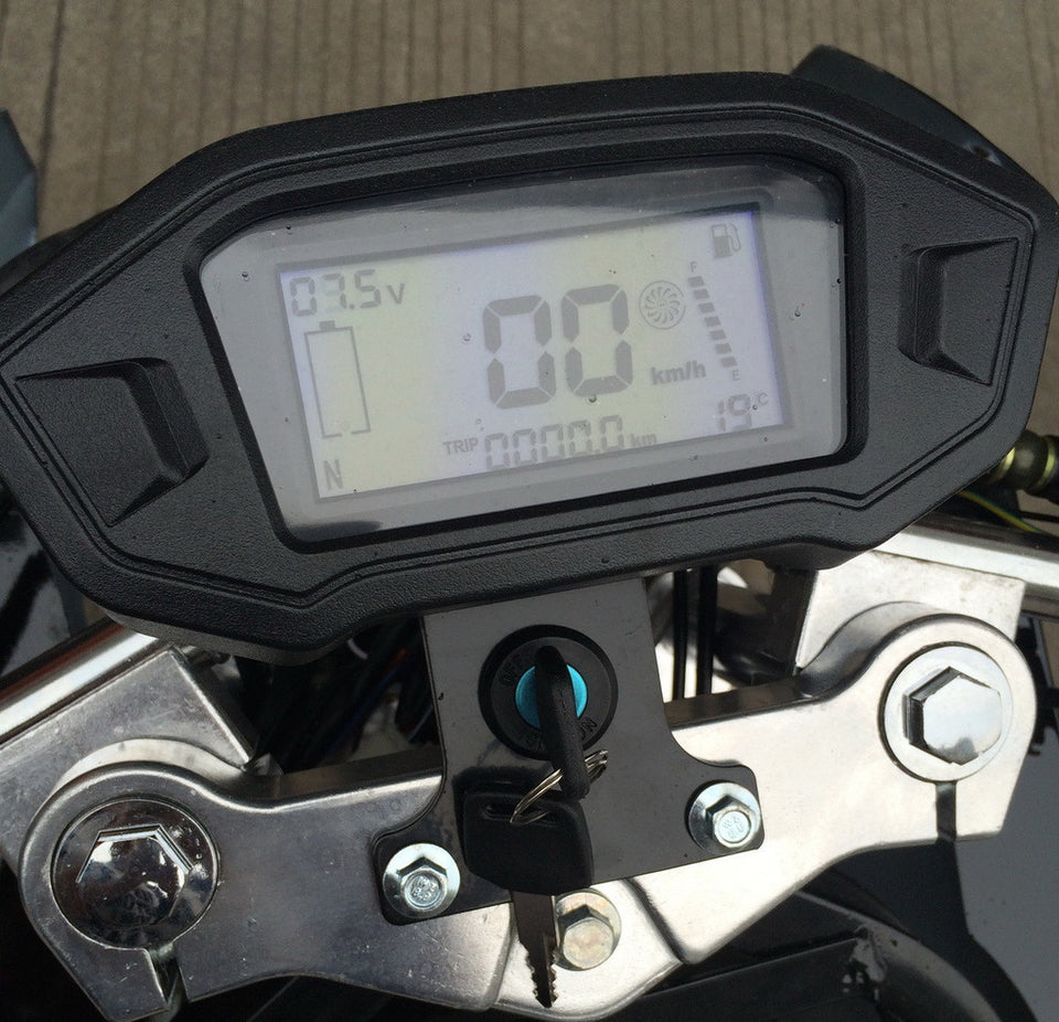 Super Pocket Bike x19 Pocket Rocket 110cc digital speedometer in mph and kmh settings. Battery life and speed / gas indicator with mileage revealed.