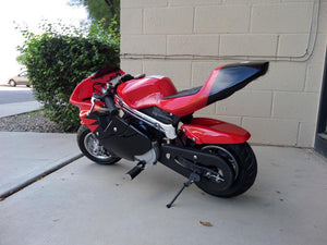 40cc Premium Gas Pocket Bike 4-Stroke in red/black combo facing backwards revealing hand brake side from the rear. Red paint higher portion of pocket bike and black painting on lower portion of pocketbike