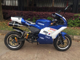 Venom Super Pocket Bike x19 Pocket Rocket 110cc in blue and white yamaha edition color combo with racing stickers all around bike. Nice silver rims, gold foot pegs and monster handle bars