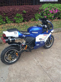 Venom Super Pocket Bike x19 Pocket Rocket 110cc in blue and white yamaha edition color combo with racing stickers all around bike sitting sideways dual high performance exhaust pipes